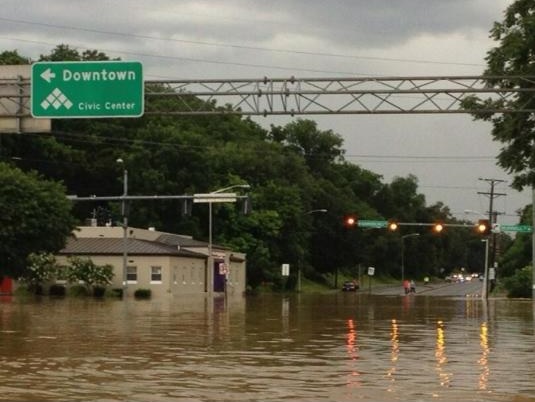 Severe flooding blamed for traffic signal malfunction and ensuing chaos.